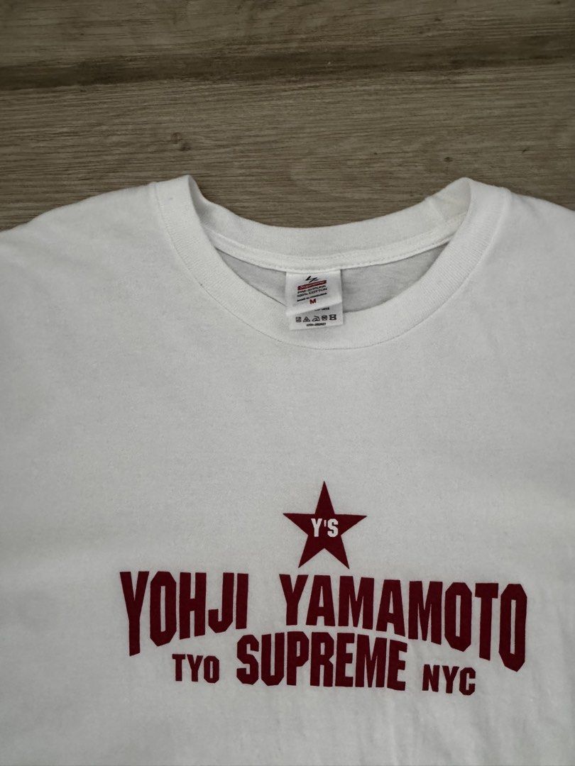 Yohji Yamamoto Tyo Supreme NYC T-shirt (Category: Tshirts & Polo Shirts) located in Singapore. Submitted by authentic100 (Listing ID 1443721710, Image 2). Description: - White t-shirt - Features Yohji Yamamoto Tyo Supreme NYC graphic print - Short sleeves - Crew neck - Size: Medium (M) - Ideal for casual wear My loss is your gain.