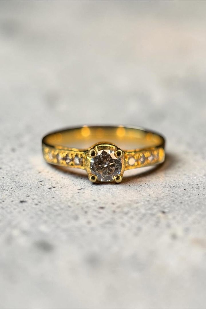 14K Gold Diamond Solitaire Ring (Category: Rings) located in Baguio. Submitted by asna_taku (Listing ID 1444020185, Image 1). Description: A brilliant solitaire diamond set in solid 14K gold, accented by delicate side diamonds that add just enough sparkle without taking away from the star of the show. 💎 14K Diamond Solitaire Ring ✨ Natural Diamond Center Stone ✨ Diamond-Accented Shoulders ✨ 14K Gold ⚖️ 2.5g 📏 Size 8.75 The kind of ring that nev