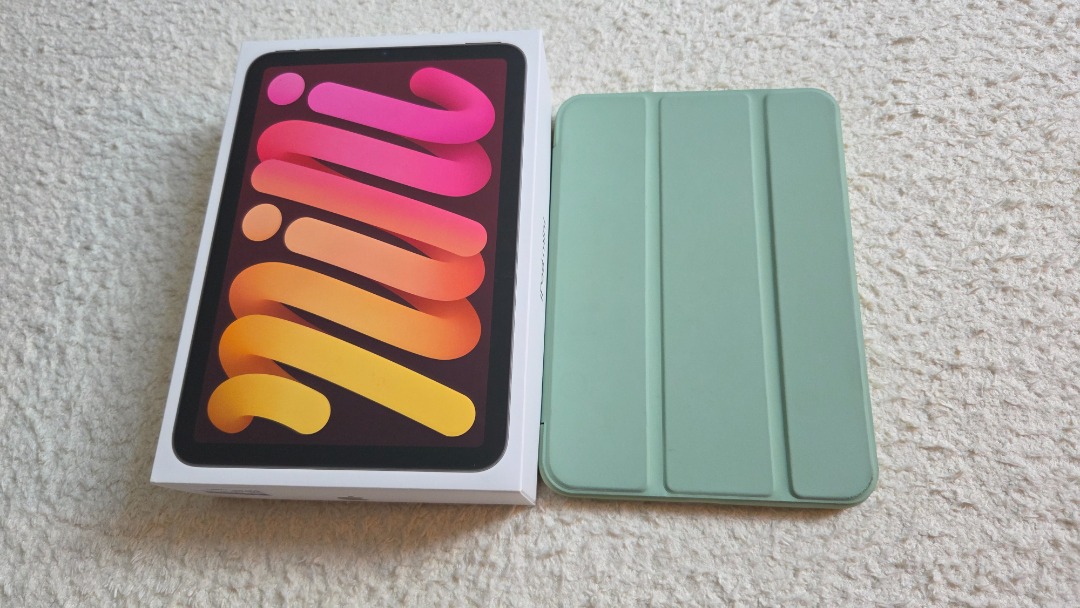 (Category: iPad) located in Singapore. Submitted by jcy912 (Listing ID 1444005607, Image 2). Description: - iPad mini (A17 Pro) 2024 - Wi-Fi model - 128GB storage - Colour: Silver - Includes original box and USB-C cable - Comes with a green Smart Folio case - Ideal for on-the-go use.