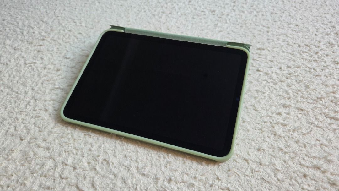 (Category: iPad) located in Singapore. Submitted by jcy912 (Listing ID 1444005607, Image 3). Description: - iPad mini (A17 Pro) 2024 - Wi-Fi model - 128GB storage - Colour: Silver - Includes original box and USB-C cable - Comes with a green Smart Folio case - Ideal for on-the-go use.