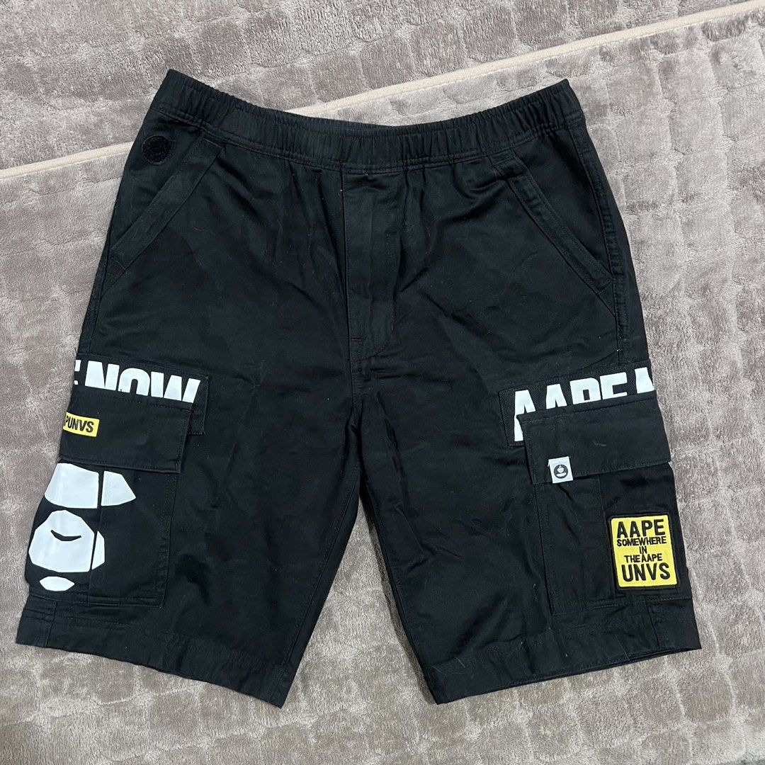 AAPE BY A BATHING APE Cargo Shorts Black Size M (Category: Shorts) located in Naga. Submitted by thirdythethird (Listing ID 1443985437, Image 1). Description: - Brand: AAPE BY A BATHING APE - Color: Black - Size: M Dimes Width: 31 inches Length: 21 inches Issue: missing patch .