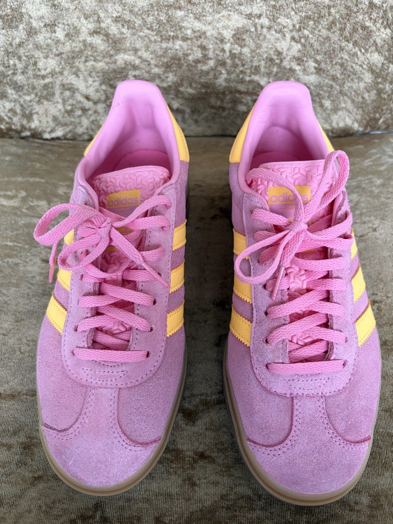 Adidas Bold Gazelle Sneakers (Category: Sneakers) located in Makati City. Submitted by tomfordgal (Listing ID 1444008070, Image 1). Description: The adidas Gazelle Bold in pink and yellow colorways—often found under the “Spark Lucid Pink” or “Bliss Pink Spark” monikers—is an iconic retro sneaker reimagined with a triple-stacked platform. It features a premium suede upper, platform gum-rubber outsole, and vibrant contrast 3-Stripes..