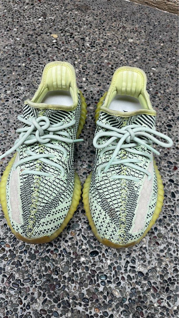 Adidas yeezy neon green (Category: Sneakers) located in Tanza. Submitted by tresmariasboutique (Listing ID 1444109886, Image 1). Description: Original 24.5 cm No inclusion.