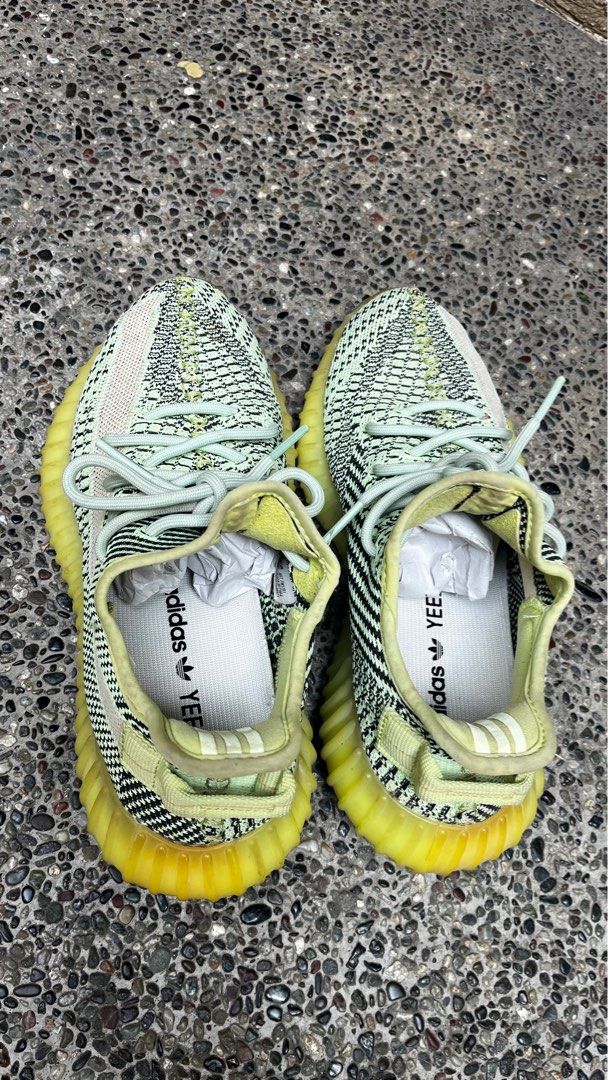 Adidas yeezy neon green (Category: Sneakers) located in Tanza. Submitted by tresmariasboutique (Listing ID 1444109886, Image 2). Description: Original 24.5 cm No inclusion.