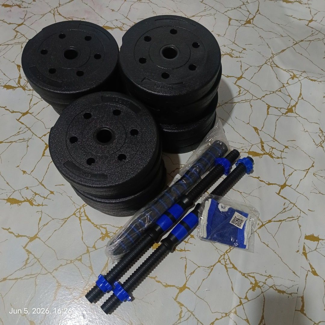 Adjustable Dumbbell Weight Set with Plates and Bars (Category: Weights & Dumbbells) located in Quezon City. Submitted by mackyisa17. (Listing ID 1443994882, Image 2). Description: - Complete dumbbell set for effective home workouts. - Includes multiple weight plates for customizable resistance. - Two dumbbell bars with comfortable, non-slip grips. - Secure spin-lock collars to keep weights in place. - Perfect for strength training and achieving y