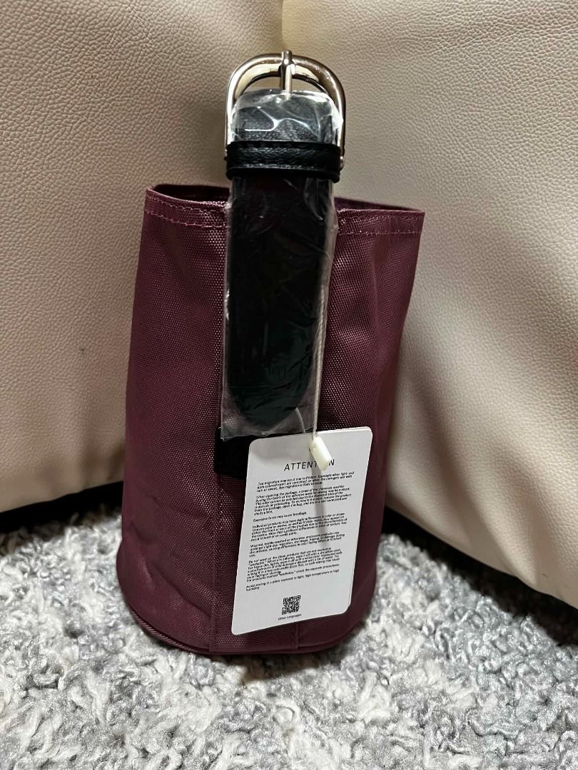 Anello Bucket Bag - Dusty Rose (Category: Cross-body Bags) located in Baguio. Submitted by cleverclover0205 (Listing ID 1443968460, Image 2). Description: - Cute Anello bucket bag - Dusty rose color - Black strap and buckle detail - Brand new with tags attached - Ideal for carrying essentials - Compact and convenient size - Scan QR code on tag to visit brand website or authenticity _Baguio based.