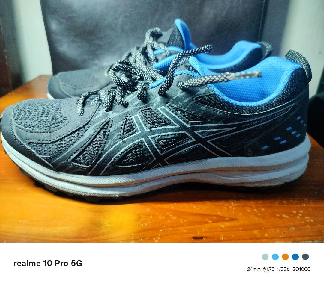 ASICS Gel-Cumulus Running Shoes (Category: Sneakers) located in Manila. Submitted by cleverturtle-2982 (Listing ID 1443916165, Image 2). Description: - ASICS Gel-Cumulus running shoes - Size: 26.5cm (US 10, EUR 42) - Color: Black and blue - Origin: Made in Cambodia - Ideal for: Running or training - Condition: Shows some signs of wear, but plenty of life left.