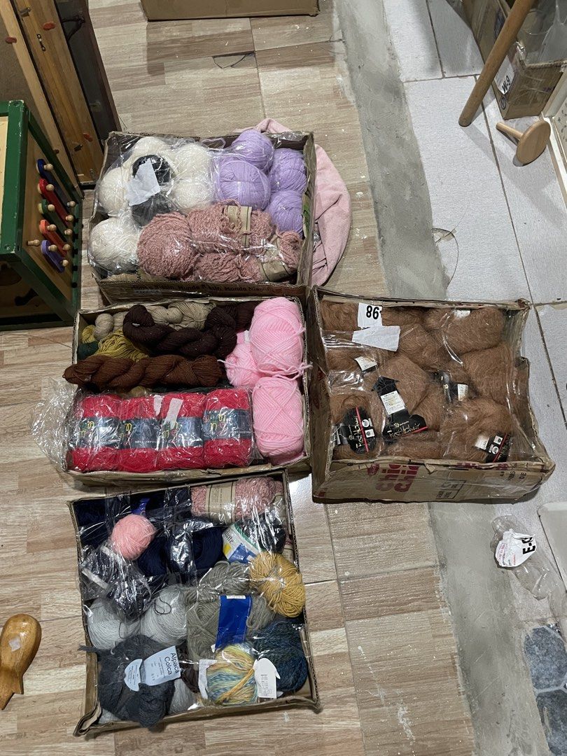 Assorted Yarn Bundles - Various Colors and Textures (Category: Craft Supplies & Tools) located in Quezon City. Submitted by eilgaraje (Listing ID 1443942116, Image 1). Description: - Large yarn bundle perfect for all your crafting needs. - Assorted colors including pink, purple, white, red, navy, grey, and brown. - Variety of yarn weights: chunky and fine. - Ideal for knitting and crochet projects. - Some skeins are tagged, others are untagged. -