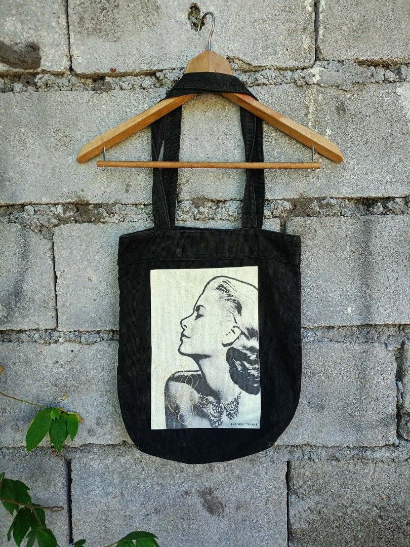 ATSURO TAYAMA (Category: Belt bags, Clutches and Pouches) located in General Santos City (Dadiangas). Submitted by evolveorrepeat1991 (Listing ID 1443608247, Image 2). Description: This graphic art piece is a limited edition tote bag by Japanese designer Atsuro Tayama(paris - based japanese designer), featuring a profile of Hollywood icon Grace Kelly (actress/princess of monaco). in very good used condition dm to purchase.