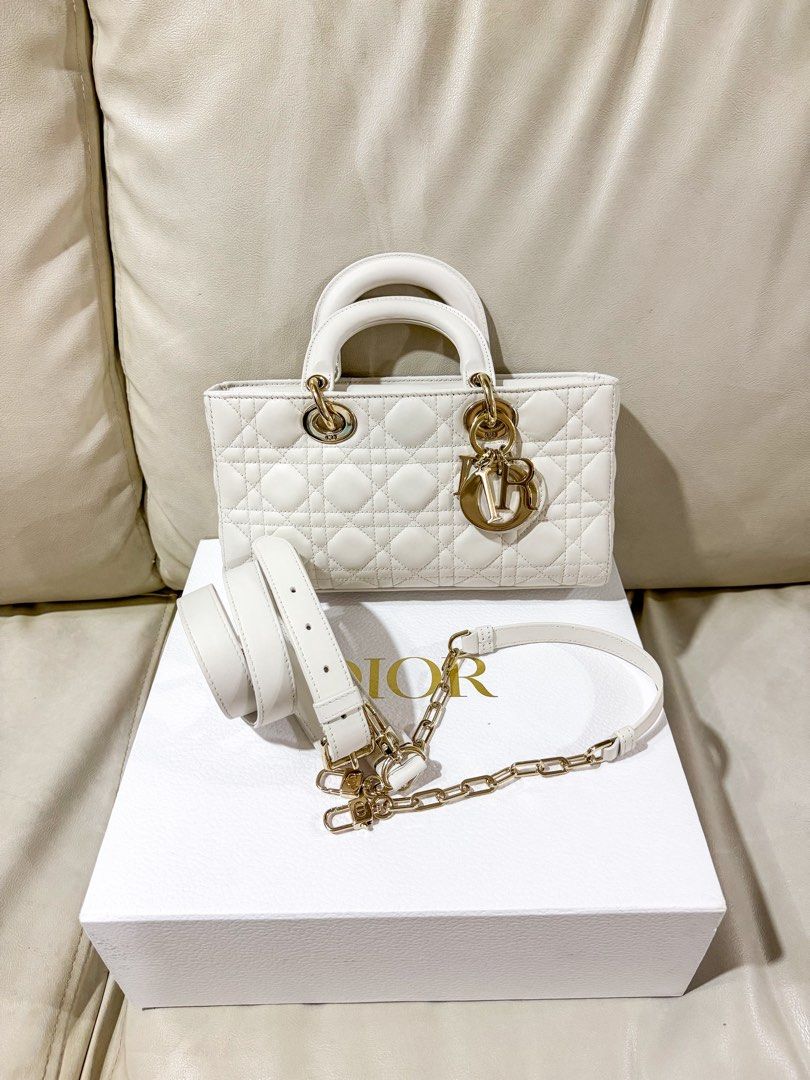 AUTHENTIC Dior D-Joy Medium in White Cannage Leather GHW (Category: Luxury Bags & Wallets) located in Quezon City. Submitted by closetofcoco (Listing ID 1443939825, Image 1). Description: GUARANTEED AUTHENTIC PM FOR INQUIRIES NO LOW BALLING.