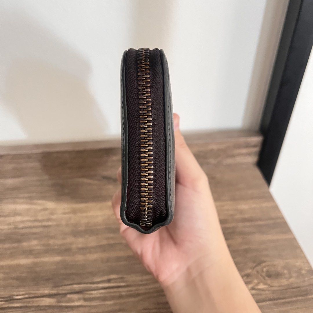 Authentic Furla Wallet (Category: Luxury Bags & Wallets) located in Trece Martires City. Submitted by imwelllovedvintage (Listing ID 1443928788, Image 3). Description: Authentic Furla Compact Wallet •repainted from red to black •faded hardwares •has texture from repainting (outside only) •clean inside •major flaw in the last pic ❌LOW BALLERS WILL BE IGNORED ❌NO 🍊 CHECKOUT ❗️STRICTLY 1 DAY RESERVATION ONLY ❗️LAYAWAY OPTION AVAILABLE ❗️LAYAWAY TER