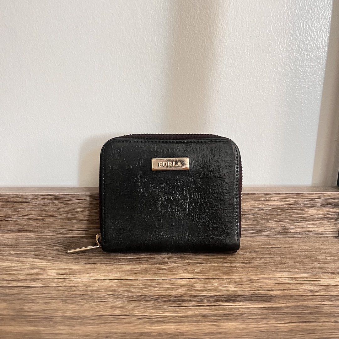 Authentic Furla Wallet (Category: Luxury Bags & Wallets) located in Trece Martires City. Submitted by imwelllovedvintage (Listing ID 1443928788, Image 1). Description: Authentic Furla Compact Wallet •repainted from red to black •faded hardwares •has texture from repainting (outside only) •clean inside •major flaw in the last pic ❌LOW BALLERS WILL BE IGNORED ❌NO 🍊 CHECKOUT ❗️STRICTLY 1 DAY RESERVATION ONLY ❗️LAYAWAY OPTION AVAILABLE ❗️LAYAWAY TER