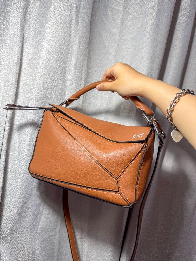 AUTHENTIC Loewe Small Puzzle Bag in Caramel Silver Hardware (Category: Luxury Bags & Wallets) located in Quezon City. Submitted by closetofcoco (Listing ID 1443931253, Image 3). Description: GUARANTEED AUTHENTIC PM FOR INQUIRIES NO LOW BALLING.