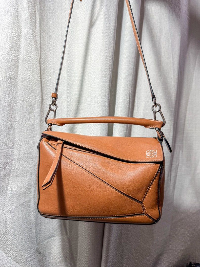 AUTHENTIC Loewe Small Puzzle Bag in Caramel Silver Hardware (Category: Luxury Bags & Wallets) located in Quezon City. Submitted by closetofcoco (Listing ID 1443931253, Image 1). Description: GUARANTEED AUTHENTIC PM FOR INQUIRIES NO LOW BALLING.