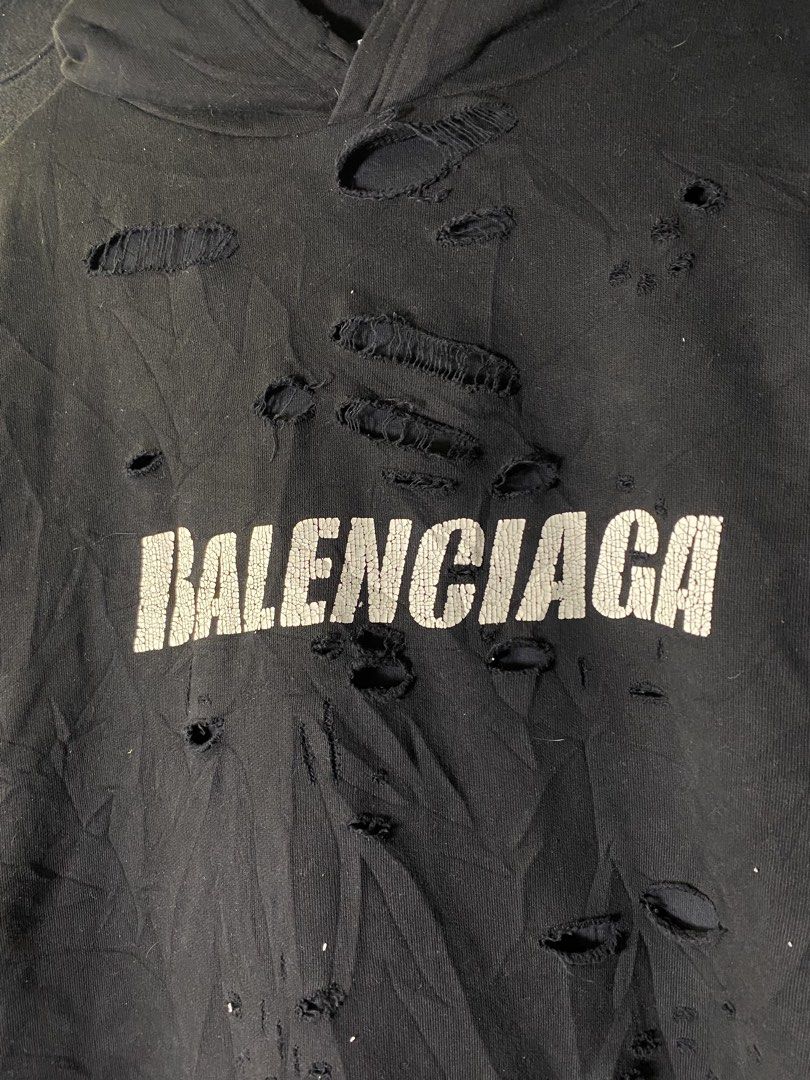 Balenciaga distressed hoodie (Category: Coats, Jackets and Outerwear) located in Manila. Submitted by ercmrsmam (Listing ID 1444080928, Image 2). Description: BALENCIAGA DISTRESSED HOODIE DOUBLE INNER LINING HEAVY COTTON W29 L29.5 Color may vary due to lighting Need wash Dm if interested 📩 will be posted on my carousell acc⬇️ Check out ercmrsmam listings on #Carousell: https://carousell.app.link/mu0SnqUHP3b 📍baclaran paranaque metro manila 🛵jn