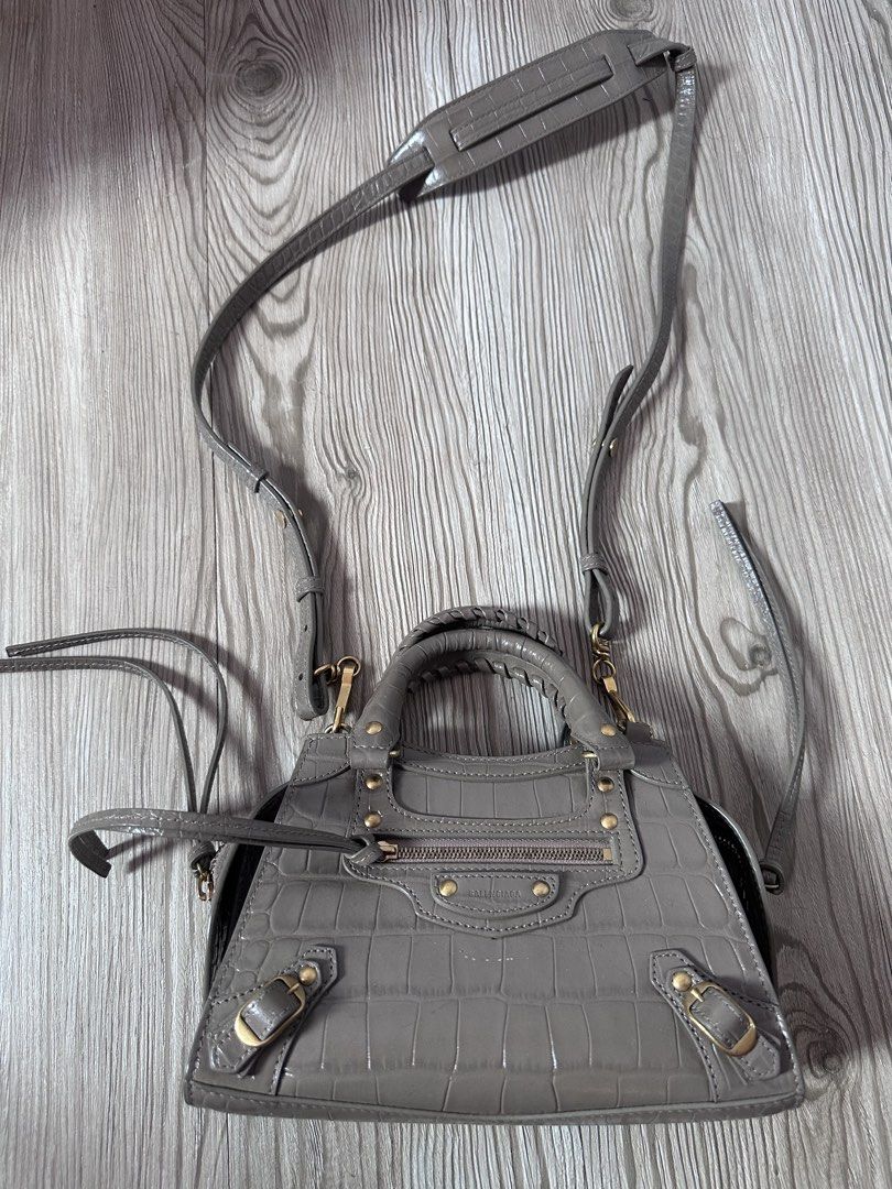 Balenciaga Neo City Croc (Category: Purses & Pouches) located in Bay. Submitted by joce76122 (Listing ID 1443963404, Image 1). Description: Selling my pre-loved original Balenciaga Neo City Croc in nude beige color. I got it from a trusted online seller in Philippines, but now I need funds for my son, hence Im selling it at a lower price point than I got it. Bag is very chic and stylish, great for everyday errands or date nights with friends and 