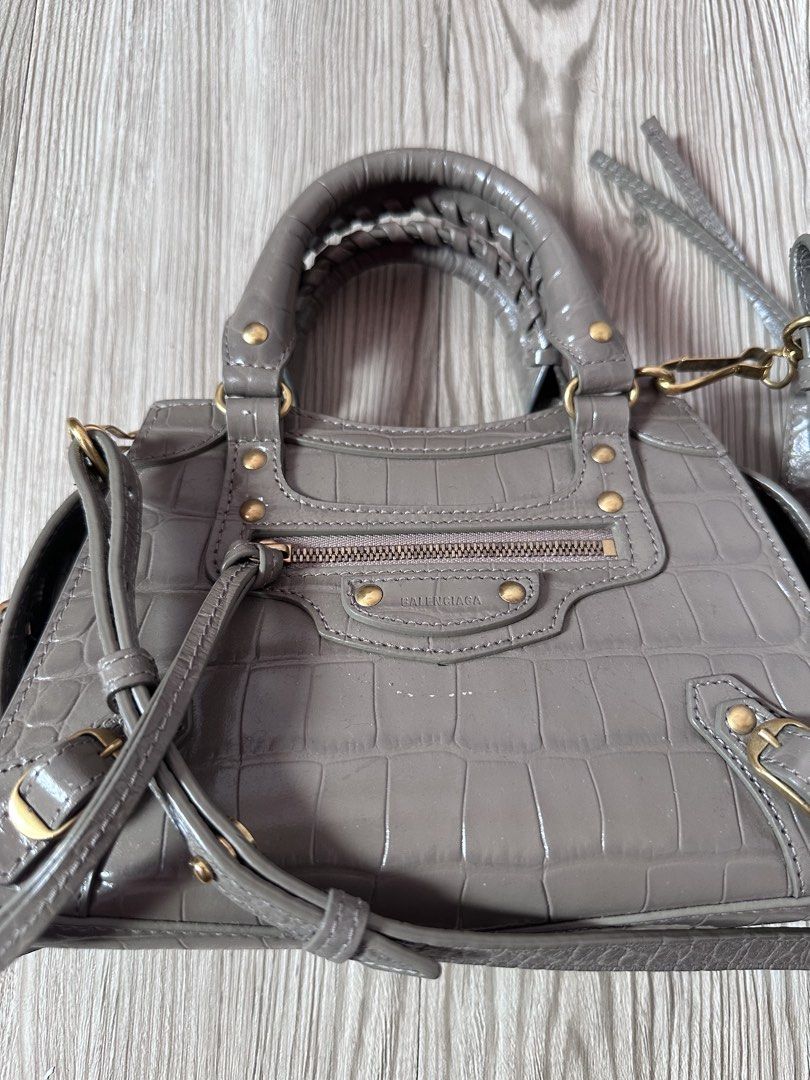 Balenciaga Neo City Croc (Category: Purses & Pouches) located in Bay. Submitted by joce76122 (Listing ID 1443963404, Image 3). Description: Selling my pre-loved original Balenciaga Neo City Croc in nude beige color. I got it from a trusted online seller in Philippines, but now I need funds for my son, hence Im selling it at a lower price point than I got it. Bag is very chic and stylish, great for everyday errands or date nights with friends and 