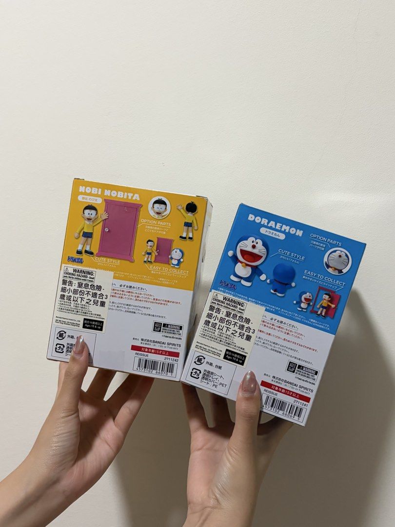 Bandai Tamashii Nations Figuarts Doraemon & Nobita Figures (Category: Toy Figures) located in Singapore. Submitted by angrypiplup (Listing ID 1444036307, Image 2). Description: - Bandai Tamashii Nations Figuarts figures - Set includes Doraemon and Nobita Nobi - Imported from Japan - Comes with option parts - Ideal for collectors.
