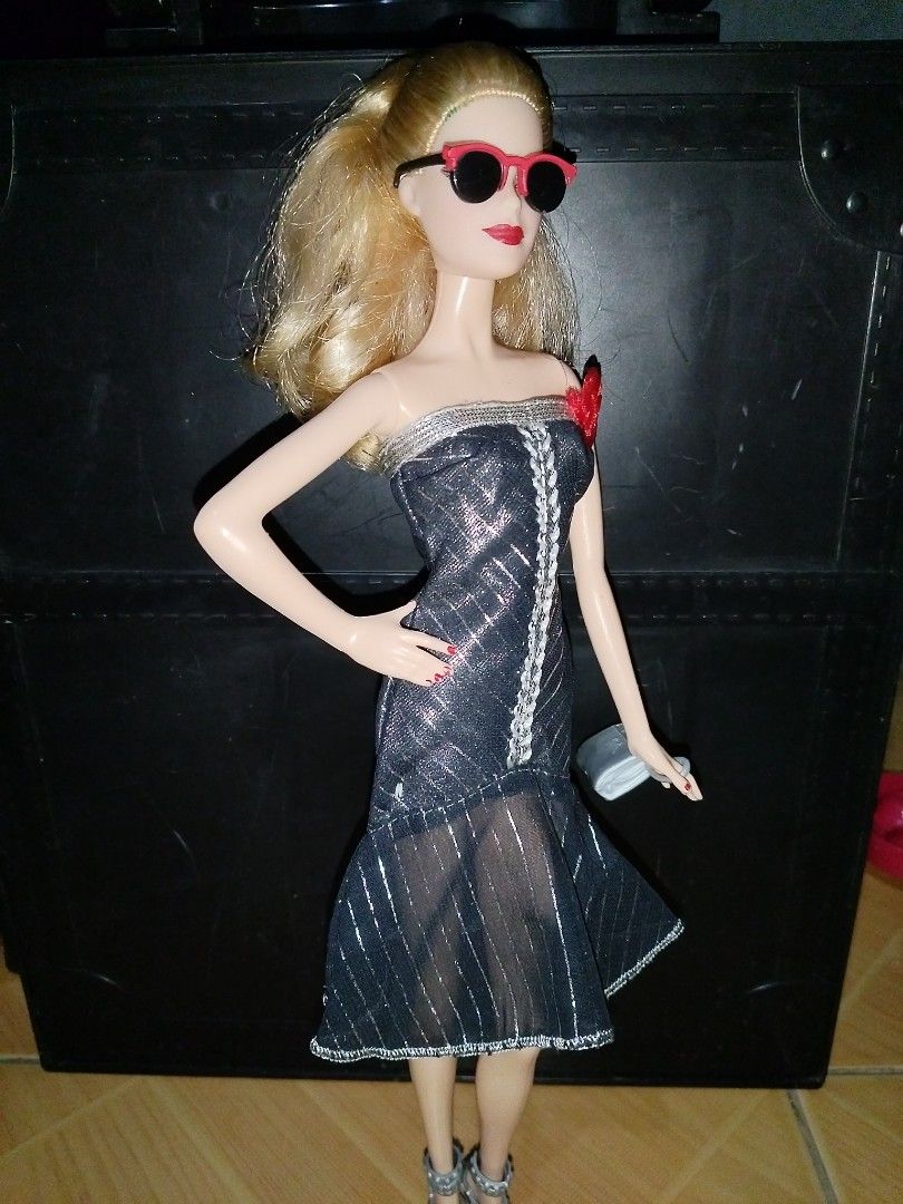 Barbie model muse (Category: Kids Toys) located in Goa. Submitted by liz1104 (Listing ID 1444042121, Image 3). Description: No cracked neck No bitemarks No broken limbs nor glued parts No penmark Minor paint chips/faded paint on nails polish. Gcash FIRST TO PAY policy Courier: j&t express Sf on buyer's expense.