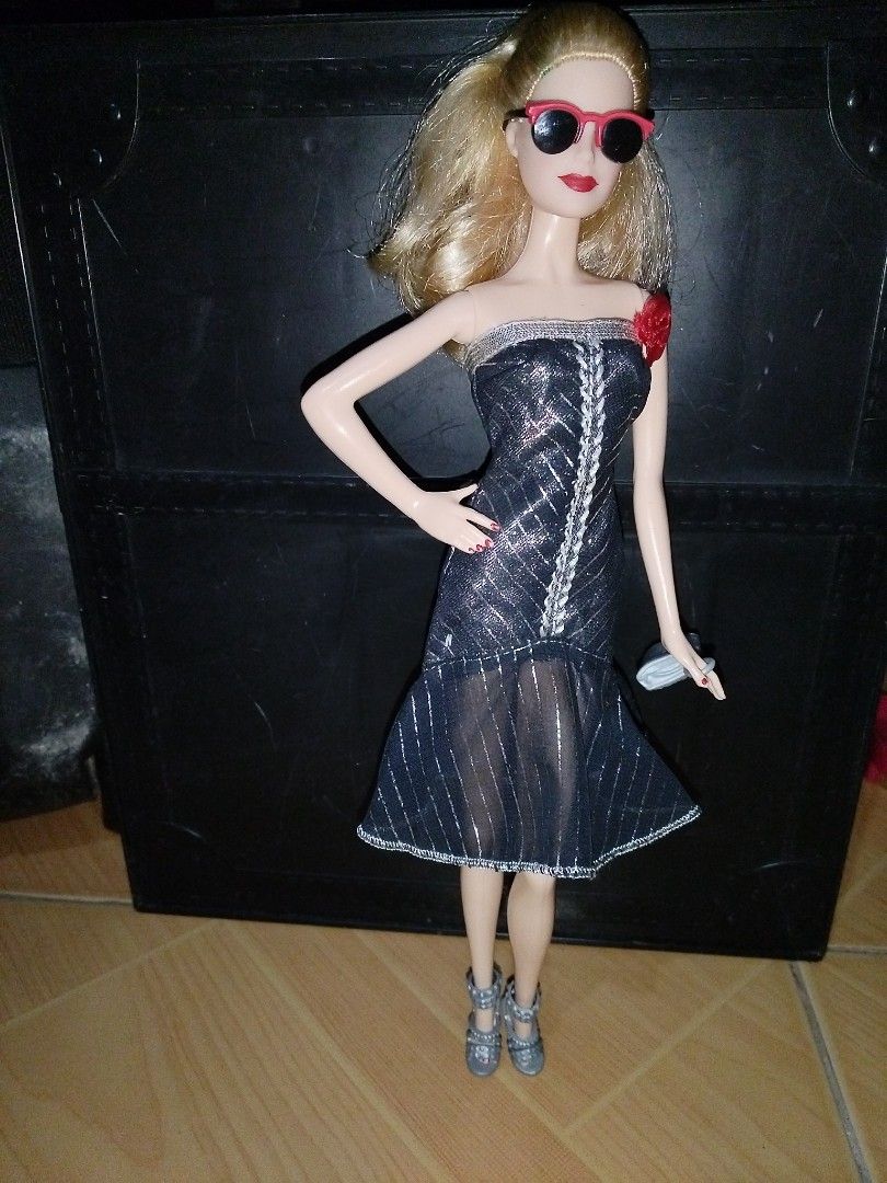 Barbie model muse (Category: Kids Toys) located in Goa. Submitted by liz1104 (Listing ID 1444042121, Image 1). Description: No cracked neck No bitemarks No broken limbs nor glued parts No penmark Minor paint chips/faded paint on nails polish. Gcash FIRST TO PAY policy Courier: j&t express Sf on buyer's expense.