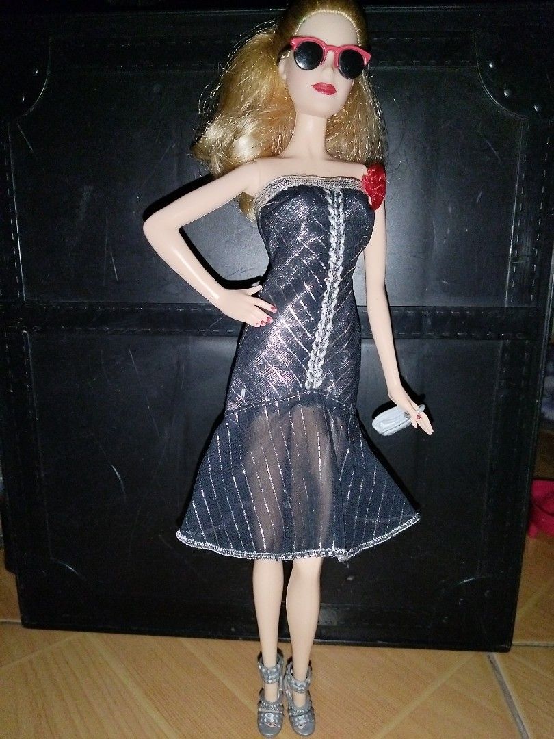 Barbie model muse (Category: Kids Toys) located in Goa. Submitted by liz1104 (Listing ID 1444042121, Image 2). Description: No cracked neck No bitemarks No broken limbs nor glued parts No penmark Minor paint chips/faded paint on nails polish. Gcash FIRST TO PAY policy Courier: j&t express Sf on buyer's expense.
