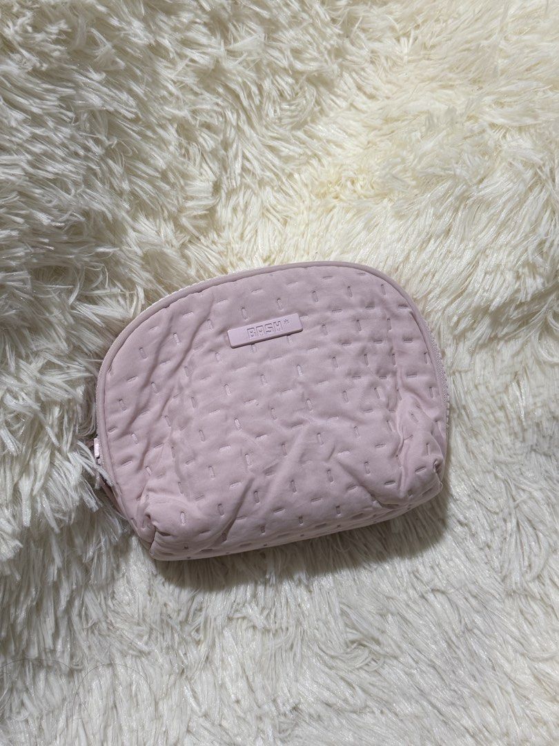 Bash Billows Pouch Blush (Category: Luxury Bags & Wallets) located in Manila. Submitted by faeseller (Listing ID 1444034525, Image 1). Description: - Light pink quilted cosmetic bag from BREMA - Features a nice textured pattern all over - Secure zipper closure - Ideal for organizing makeup or toiletries - Compact and portable size - Great for travel or everyday use.