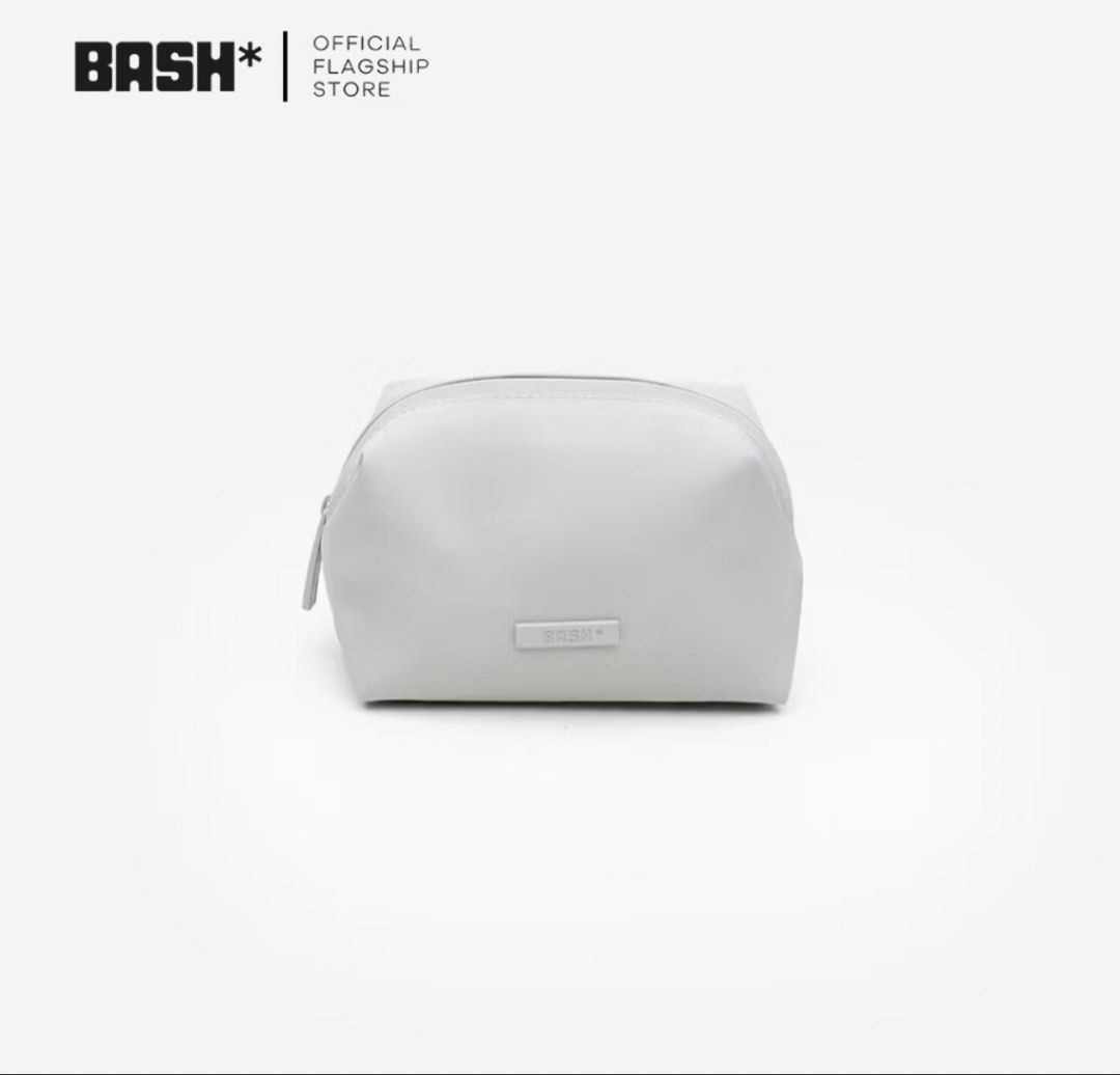 BASH* Cosmetic Bag Pouch Grey (Category: Purses & Pouches) located in Manila. Submitted by faeseller (Listing ID 1444033488, Image 1). Description: - Grey BASH* cosmetic bag - Simple and clean design - Good size for makeup or toiletries - Easy to clean material - Great for travel or everyday use.