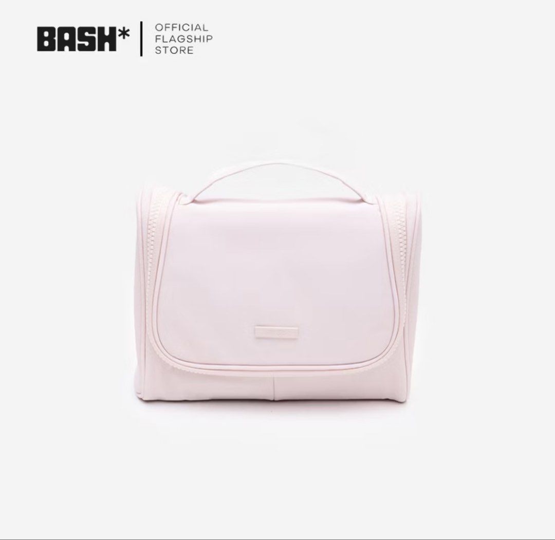 BASH* Minj Unfold Organizer Pouch (Category: Purses & Pouches) located in Manila. Submitted by faeseller (Listing ID 1444033827, Image 1). Description: - Official BASH* flagship store cosmetic bag - Chic light pink color - Convenient handle for easy carrying - Secure zipper closure - Ideal for organizing makeup and toiletries - Perfect for travel or everyday use - Simple and clean design.