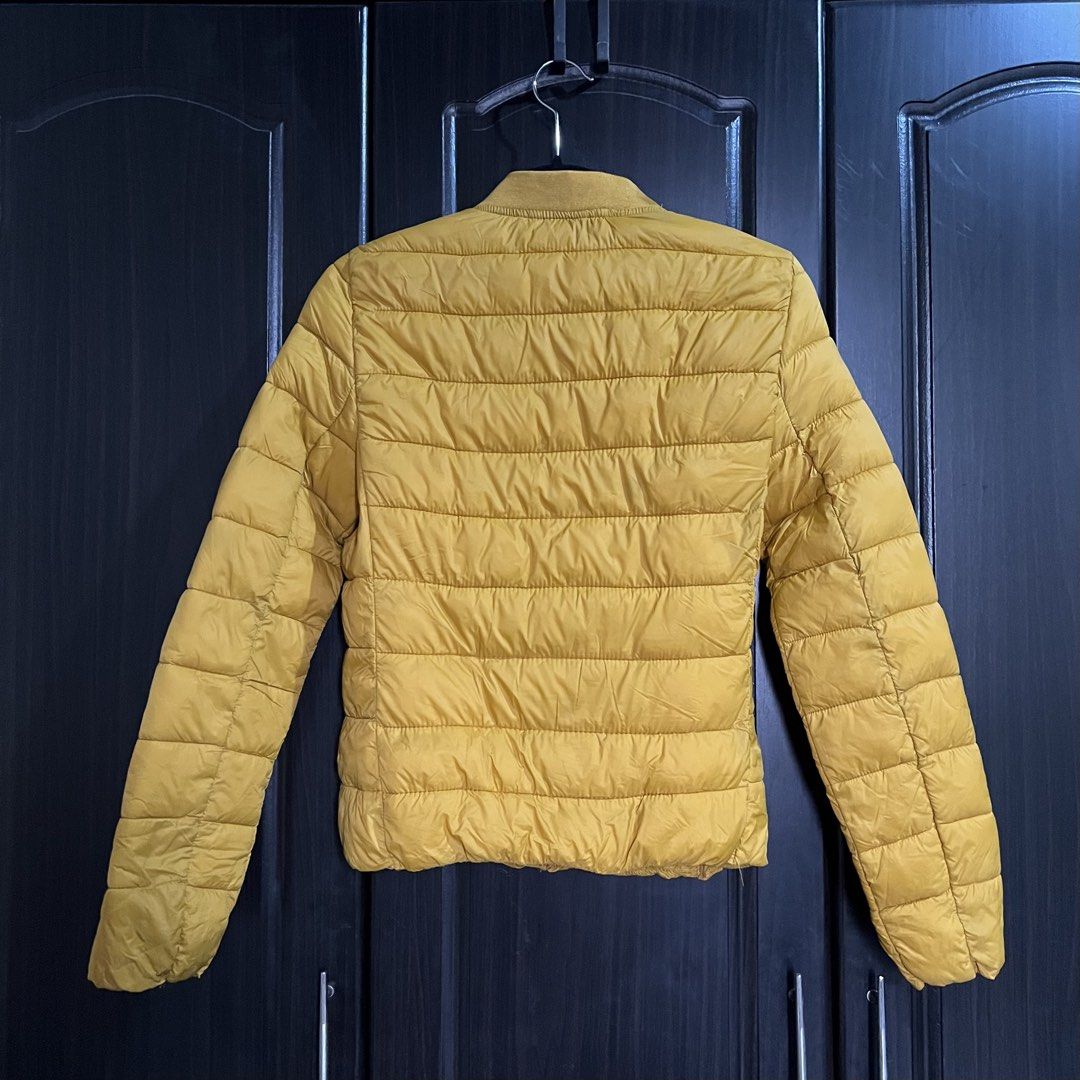 Bershka Mustard Yellow Puffer Jacket (Category: Coats, Jackets and Outerwear) located in Malvar. Submitted by shopwsf (Listing ID 1443959395, Image 3). Description: Length: 21 inches Shoulder: 14 inches Arm Length: 24 inches Chest: 31 inches Shipping: J&T, c/o buyer MOP: Gcash or Gotyme.