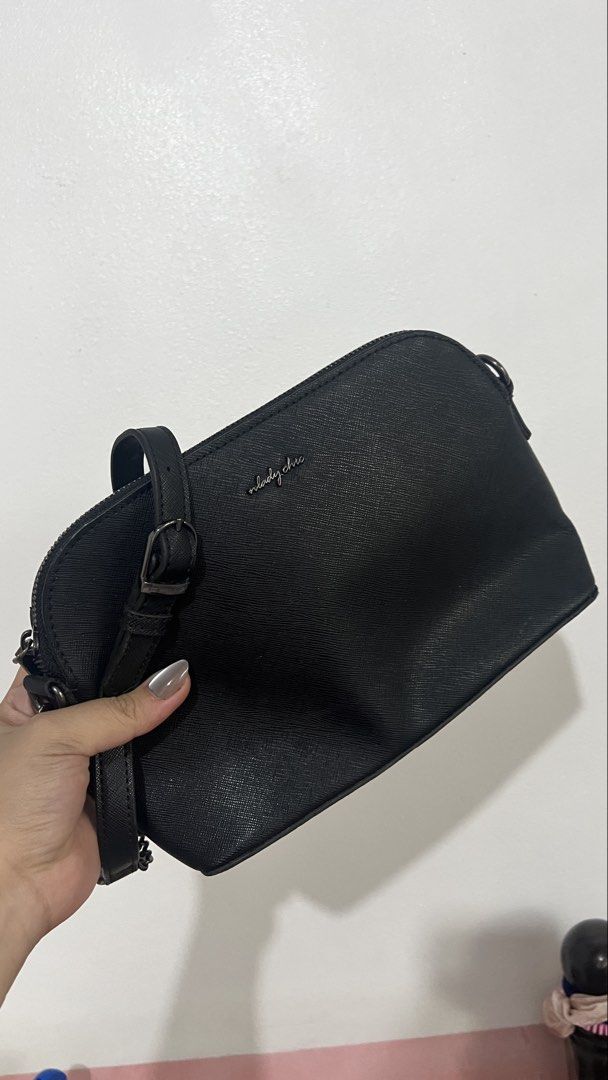 Black Dome Crossbody Bag with Chain Strap (Category: Cross-body Bags) located in San Pedro. Submitted by ae.vy (Listing ID 1443955965, Image 3). Description: - Black dome-shaped crossbody bag - Textured finish for a stylish look - Secure zipper closure - Detachable strap: use as a crossbody or shoulder bag (chain & leather included) - Simple, classic design - Ideal for everyday wear -what you see is what you get Gcash/Bank transfer ONLY (meetup o
