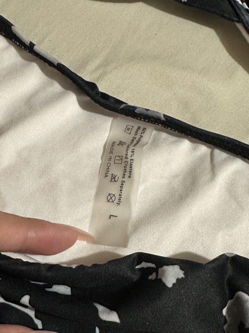 Black Floral Smocked Bikini Set - size Large (Category: Bikinis & Swimsuits) located in Quezon City. Submitted by lovemarga (Listing ID 1444004837, Image 2). Description: - Cute black bikini with white floral print - Smocked top with underwire for support - Strappy side bottoms - Size: Large (L).