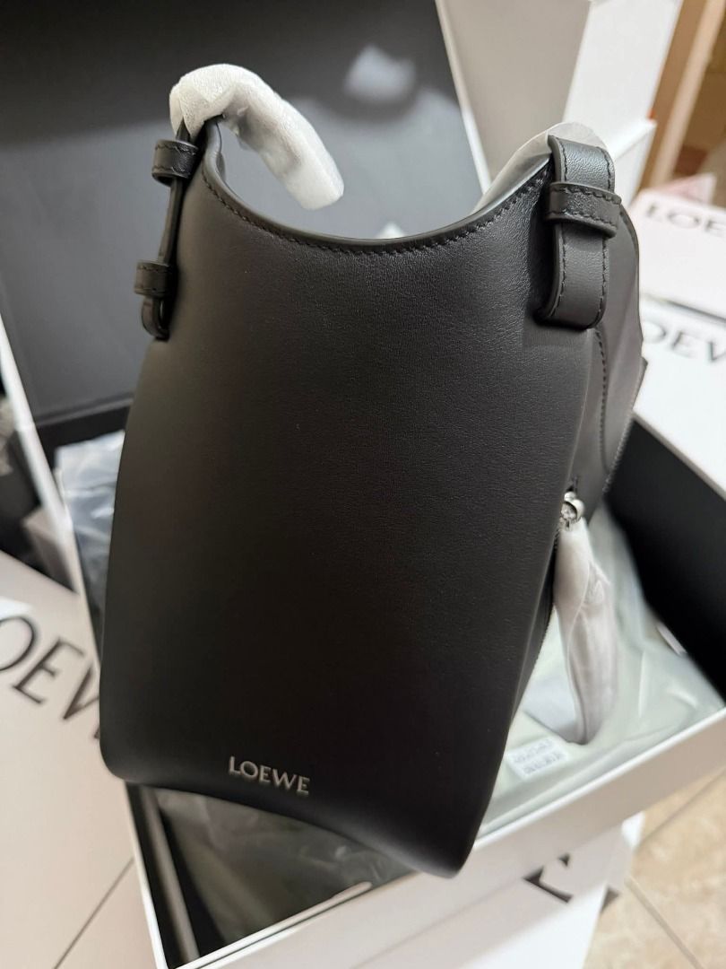 Black Leather Hammock Bag (Category: Luxury Bags & Wallets) located in Marilao. Submitted by shopforyouph (Listing ID 1443957679, Image 2). Description: Soft leather with a unique zippered front. Spacious interior with a detachable strap. Comes with dust bag and box..