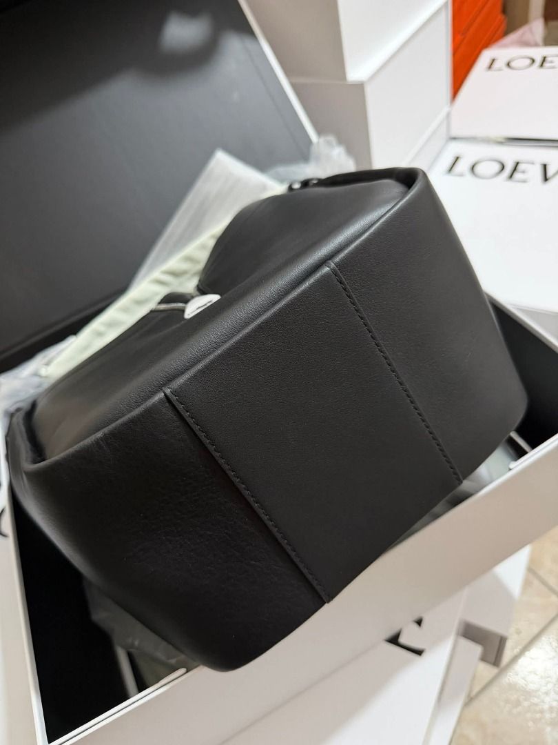 Black Leather Hammock Bag (Category: Luxury Bags & Wallets) located in Marilao. Submitted by shopforyouph (Listing ID 1443957679, Image 3). Description: Soft leather with a unique zippered front. Spacious interior with a detachable strap. Comes with dust bag and box..