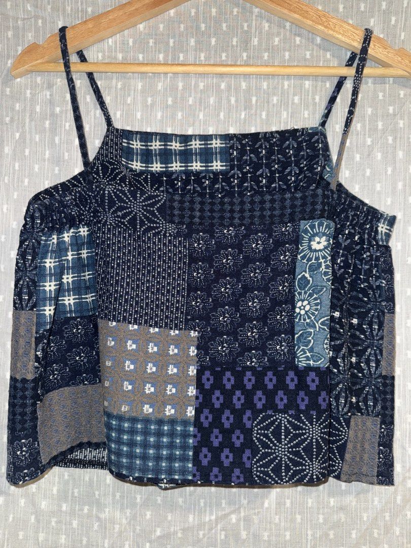Blue Patchwork Top (Category: Sleeveless) located in Singapore. Submitted by blueberrylemonloaf (Listing ID 1444104932, Image 2). Description: - Blue patchwork - Free size for a comfortable fit - Features elastic bands at the back for adjustable sizing and a flattering silhouette - Sleeveless design.