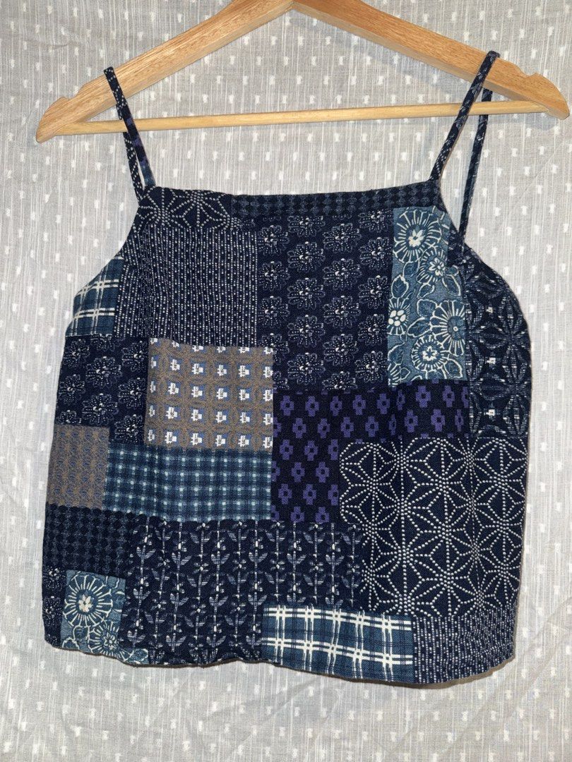 Blue Patchwork Top (Category: Sleeveless) located in Singapore. Submitted by blueberrylemonloaf (Listing ID 1444104932, Image 1). Description: - Blue patchwork - Free size for a comfortable fit - Features elastic bands at the back for adjustable sizing and a flattering silhouette - Sleeveless design.