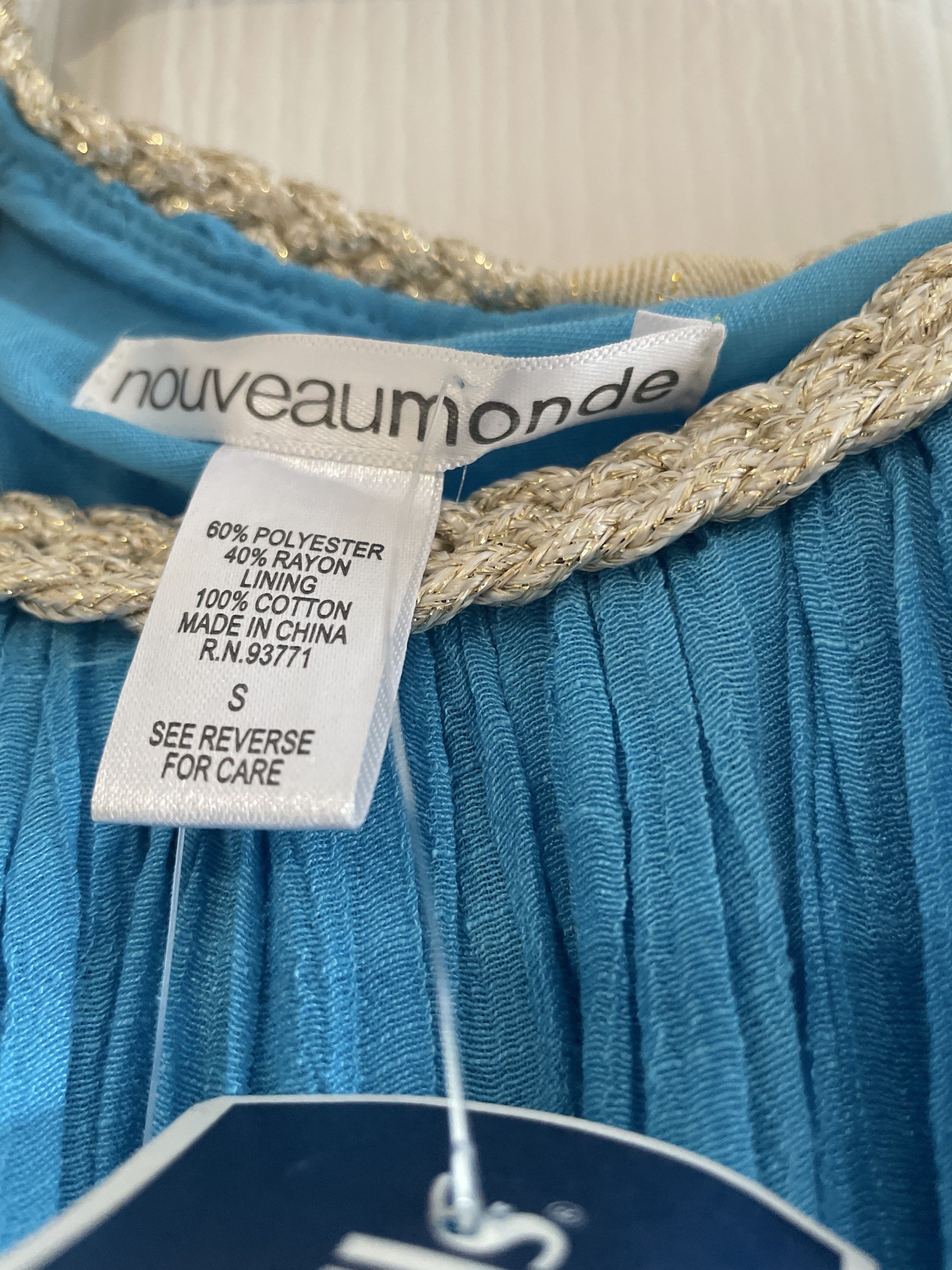 Blue Semi Formal Short Dress (Category: Dresses) located in San Juan City. Submitted by tabithajam (Listing ID 1443928169, Image 3). Description: - pretty blue color - Size: S fits XS - S - Fabric: Crinkled texture like linen - Features: Braided neckline detail No when worn For pick up in Greenhills .