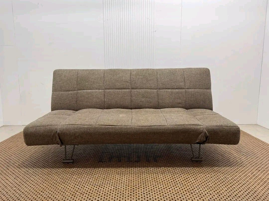 Brown Fabric Sofa Bed - Converts to Bed (Category: Sofas) located in Manila. Submitted by eloizavill76462 (Listing ID 1444063277, Image 1). Description: Nitori Sofa Bed L72 x W22/45 x H34/15 In good condition.