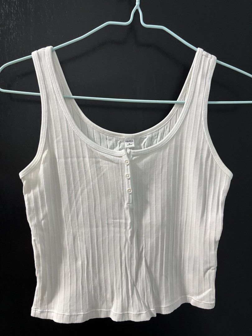 Bundle Tank Tops (Category: Sleeveless) located in Singapore. Submitted by 0ziaar (Listing ID 1444081663, Image 2). Description: White tank tops and black wide arm tank top - may have minor defects (not for fussy buyers).