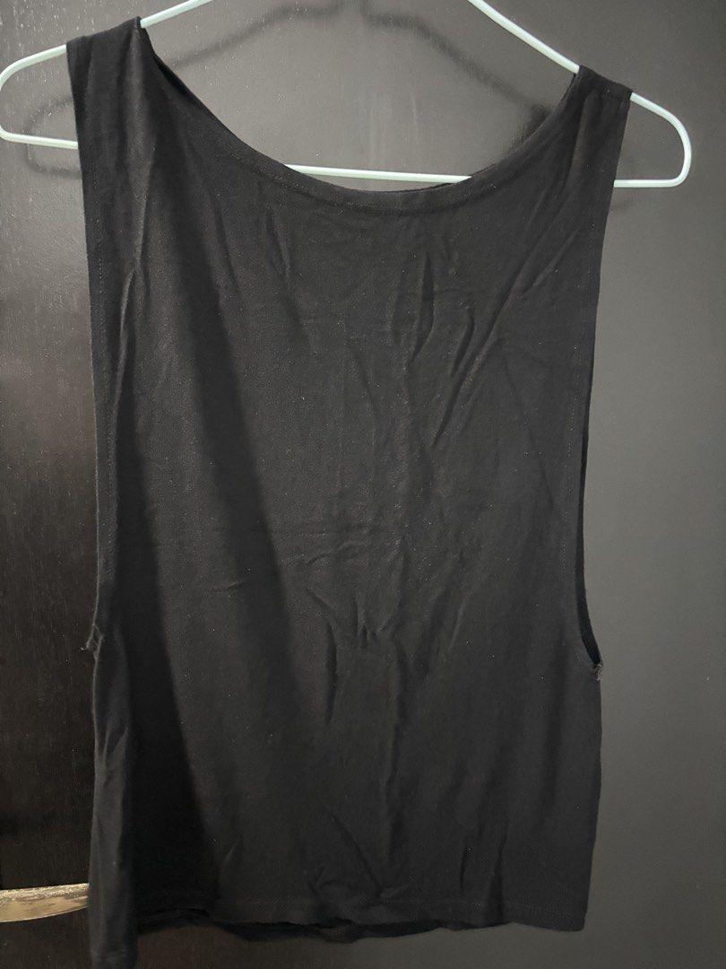 Bundle Tank Tops (Category: Sleeveless) located in Singapore. Submitted by 0ziaar (Listing ID 1444081663, Image 3). Description: White tank tops and black wide arm tank top - may have minor defects (not for fussy buyers).