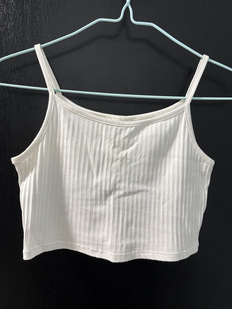 Bundle Tank Tops (Category: Sleeveless) located in Singapore. Submitted by 0ziaar (Listing ID 1444081663, Image 1). Description: White tank tops and black wide arm tank top - may have minor defects (not for fussy buyers).