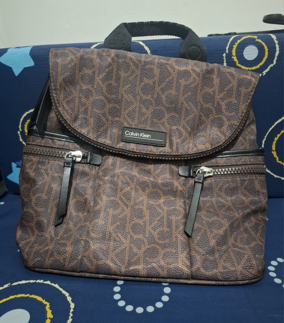 Calvin Klein Brown and Black Backpack (Category: Luxury Bags & Wallets) located in Cavite. Submitted by miin_toar (Listing ID 1444066013, Image 1). Description: Used only once.