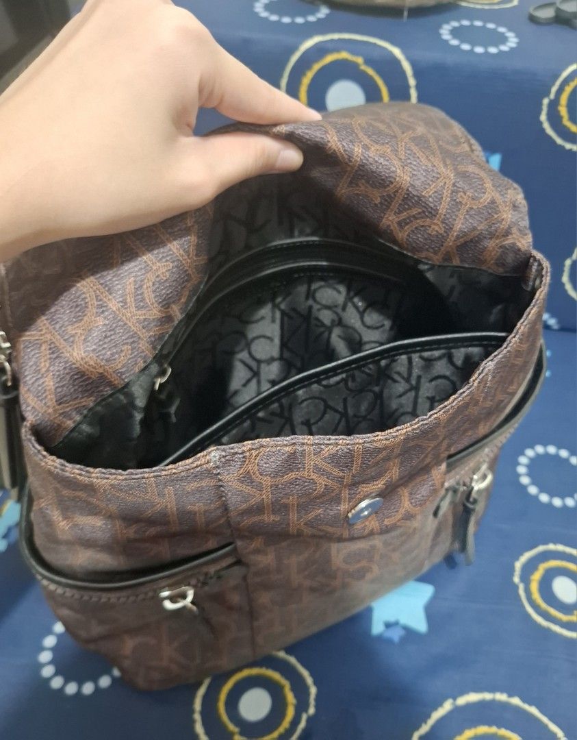 Calvin Klein Brown and Black Backpack (Category: Luxury Bags & Wallets) located in Cavite. Submitted by miin_toar (Listing ID 1444066013, Image 3). Description: Used only once.