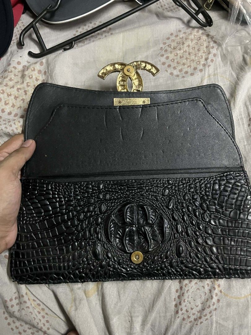 Chanel Clutch Bag Leather Design (Category: Luxury Bags & Wallets) located in Manila. Submitted by montillano25396 (Listing ID 1443954459, Image 3). Description: still in good condition with minor issues. Missing strap..
