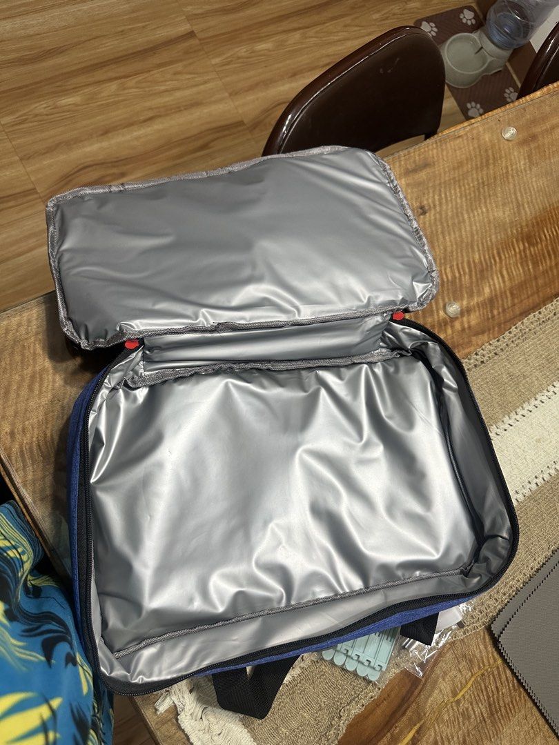 Chef's Counter Blue Insulated Lunch Bag (Category: Food Organization & Storage) located in Porac. Submitted by prelovedanddeclutter (Listing ID 1443975802, Image 3). Description: Blue insulated lunch bag from Chef's Counter. Great for keeping food cool or warm. Has a main compartment and a top compartment. Zippers work well. Handles are sturdy. Good for work or school lunches..