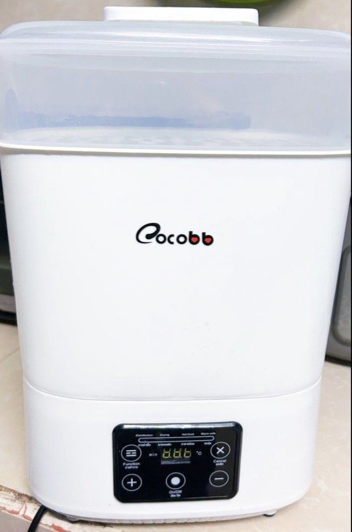 Cocobb Bottle Sterilizer and food processor stainless bundle (Category: Breastfeeding & Bottle Feeding) located in Cavite. Submitted by butfirstdecluttering (Listing ID 1444026861, Image 2). Description: Bottle sterilizer with food processor bundle - White Cocobb bottle sterilizer - Functions: Sterilize, Dry, Keep Warm - Digital display shows time and temperature - Simple, easy-to-use buttons - Ideal for baby bottles and other baby essentials - P