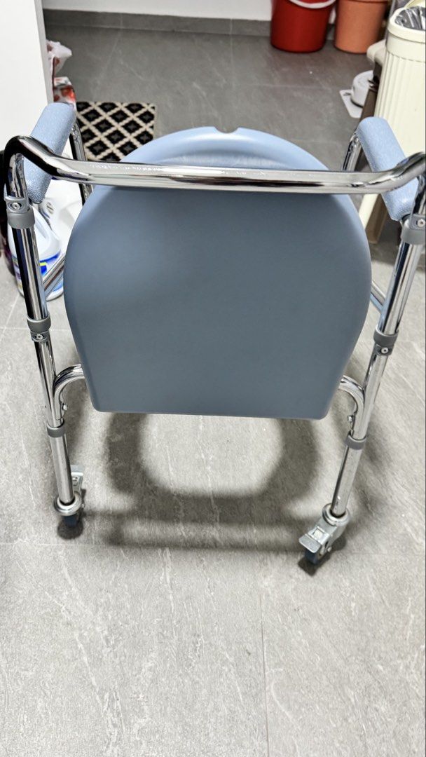 Commode (Category: Rehabilitative Devices) located in Singapore. Submitted by matchaxcaramel (Listing ID 1444025328, Image 3). Description: There’s a lil rusty metal part and bended on the seat. But it is still in good shape. Pickup: Teck Whye Lane Provide your own transport.