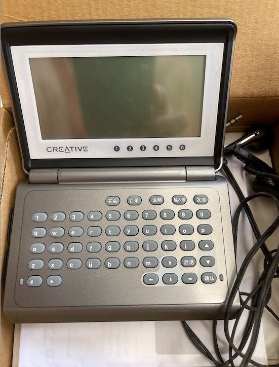 Creative Technology Mandarin E-Dictionary (Category: Stationery & School Supplies) located in Singapore. Submitted by ambersand (Listing ID 1443941311, Image 3). Description: - Full QWERTY keyboard - Includes earbuds and cables - Buttons for Chinese characters, switch, directory, explanation, input method, pronunciation - Compact and portable design - Great for language learning or travel.