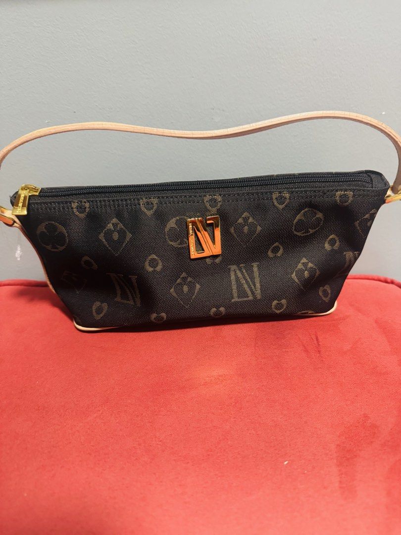 Diana Valentino Paris Monogram Shoulder Bag (Category: Purses & Pouches) located in Quezon City. Submitted by TGDL123 (Listing ID 1444034472, Image 1). Description: - Cute Diana Valentino Paris shoulder bag - Signature all-over monogram pattern - Gold hardware details - Zipper closure - Light tan colored strap - Small and compact, perfect for essentials.