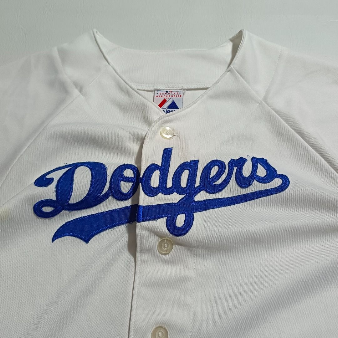 Dodgers Baseball Jersey (Category: Activewear) located in Baguio. Submitted by freshmarket_2600 (Listing ID 1444056127, Image 2). Description: Brand: Dodgers Baseball Jersey Tags: Complete Size: M-L womens Dimension: L25W20 Condition: Excellent Color rate: 10/10 Color: White Issue/s: None.