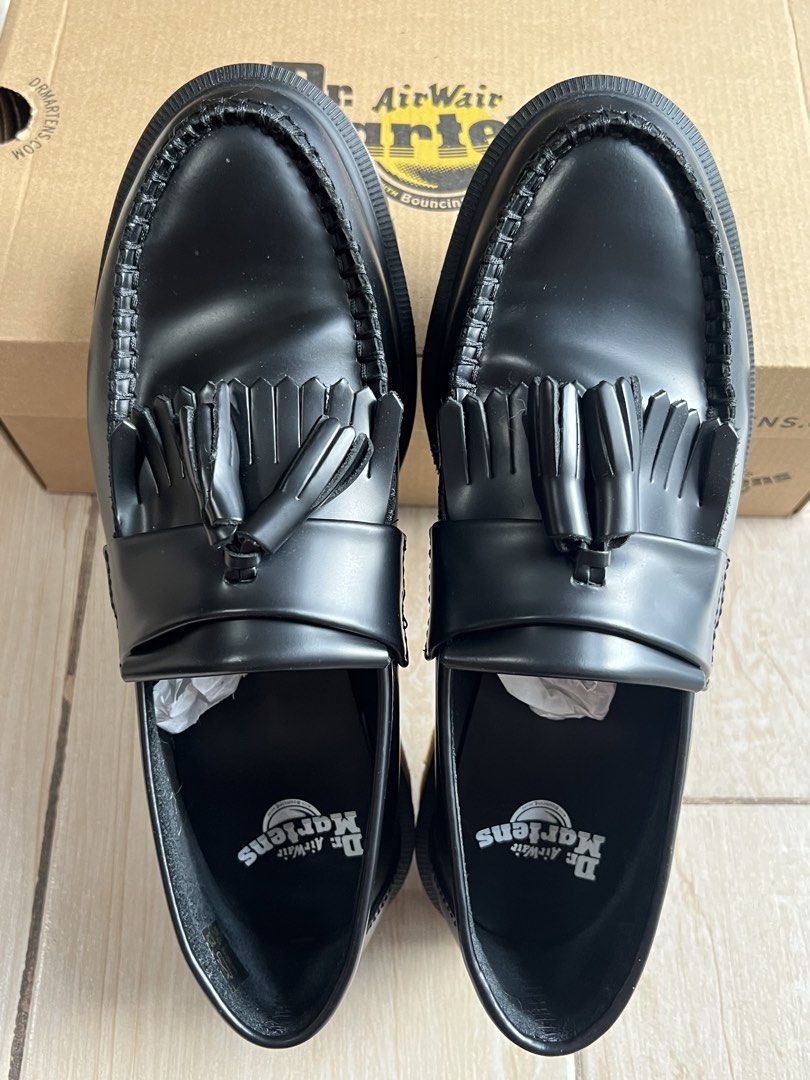 Dr. Martens Adrian Black Tassel Loafers (Category: Dress Shoes) located in Quezon City. Submitted by carlSELL (Listing ID 1443964530, Image 1). Description: Size: US 8(mens) / UK 7 Condition: Like New (used couple of times in mall) Location: Eastwood Libis (ship or pick up only) W/ original box.